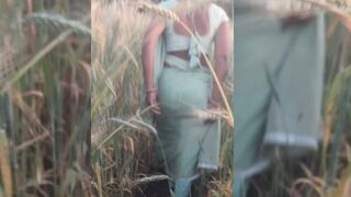 Desi beautiful sister-in-law is rubbing her ass in the wheat field Tormenting her brother-in-law for sex Rubbing her fat ass in the open field for sex