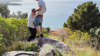 Spontaneous sex while hiking with a view over the city