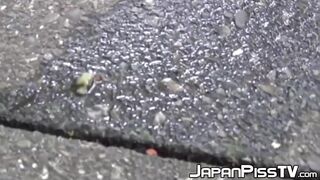 Tantalizing Japanese girl peeing in front of someone bicycle