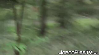 Tantalizing Japanese in skirt peeing behind bench in park