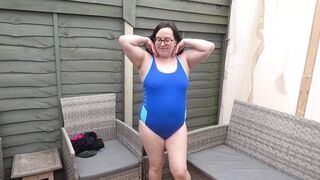 wife posing in tight Swimsuit