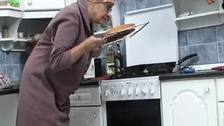 In the kitchen with the old slut!